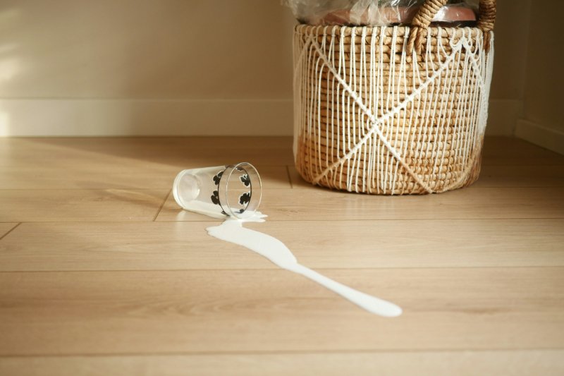 Nursery with baby crib and vinyl plank flooring
